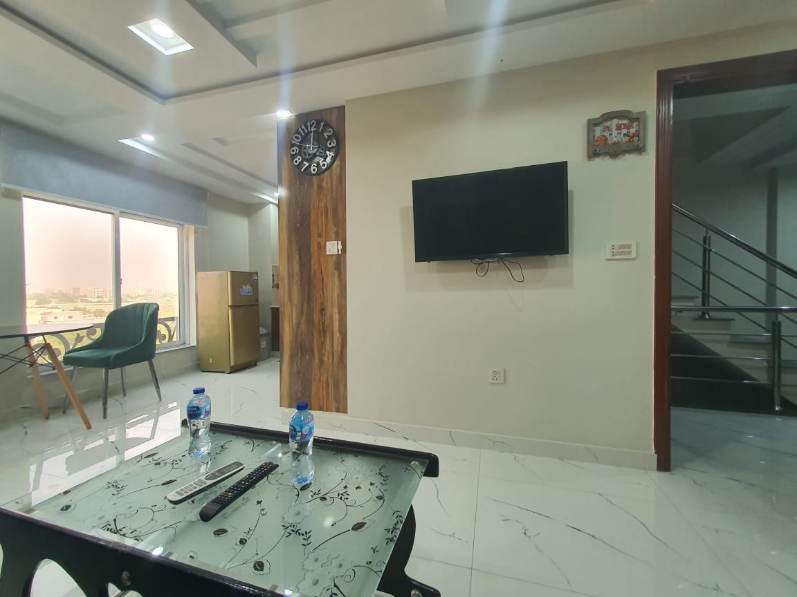 Single bed Brand New Apartment For Sale In Sector-E Quaid commercial block Bahria town Lahore