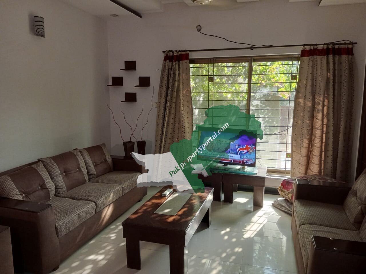 5 Marla house for sale In the center of sector D Bahria town Lahore