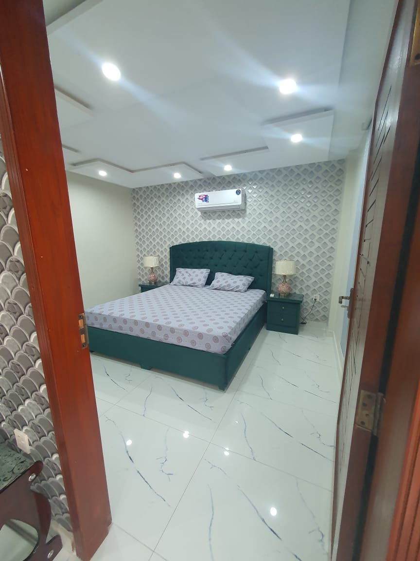 Single bed Brand New Apartment For Sale In Sector-E Quaid commercial block Bahria town Lahore